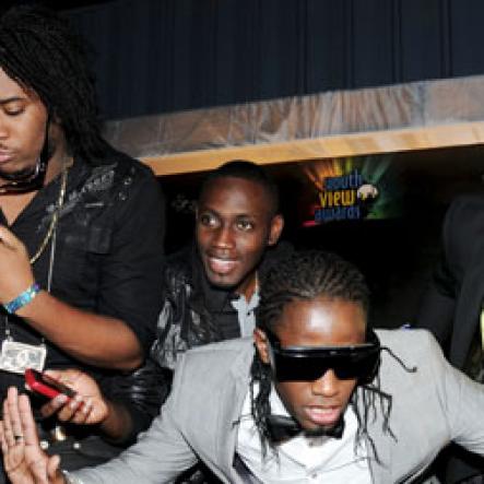 Winston Sill / Freelance Photographer
                                                                   Ding Dong (centre) and his Ravers Clavers.                                                                                                                                                                                                                            Youth View Awards Show and Presentation, held at the National Indoor Sports Centre (NISC), Stadium Complex on Saturday night February 5, 2011.