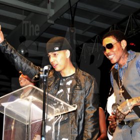 Winston Sill / Freelance Photographer
                                                                   Russian (left) and Vybz Kartel show off their awards.                                                                                                                                                                                               Youth View Awards Show and Presentation, held at the National Indoor Sports Centre (NISC), Stadium Complex on Saturday night February 5, 2011.
