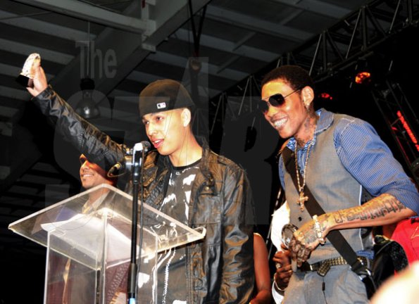 Winston Sill / Freelance Photographer
                                                                   Russian (left) and Vybz Kartel show off their awards.                                                                                                                                                                                               Youth View Awards Show and Presentation, held at the National Indoor Sports Centre (NISC), Stadium Complex on Saturday night February 5, 2011.