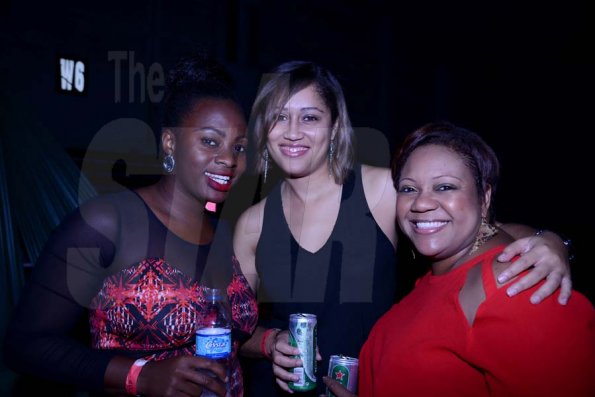 Winston Sill/Freelance Photogtapher
The Heineken sponsored Yush-Mega Club- Party, held at the National Indoor Sports Centre, Stadium Complex on Saturday night December 28, 2013. Here are Pepsi Carla Hollingsworth (left); and Red Stripe's duo of  Erin Mitchell (centre); and Nasha Douglas (right).