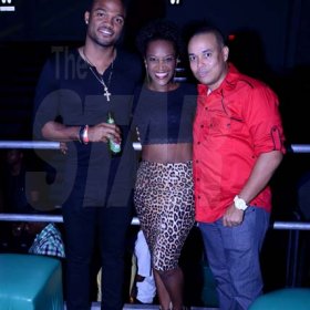 Winston Sill/Freelance Photogtapher
The Heineken sponsored Yush-Mega Club- Party, held at the National Indoor Sports Centre, Stadium Complex on Saturday night December 28, 2013. Here are Imru James?? (left); Paula Pinnock-McLeod (centre); and LIME Carlo Redwood (right).